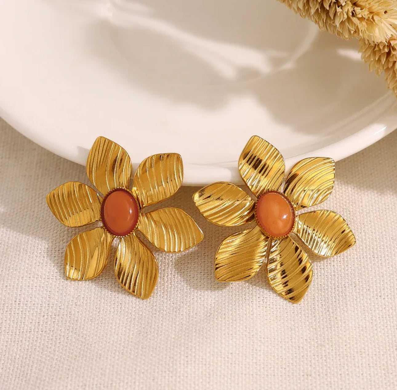 Aretes de acero inoxidable con baño de oro