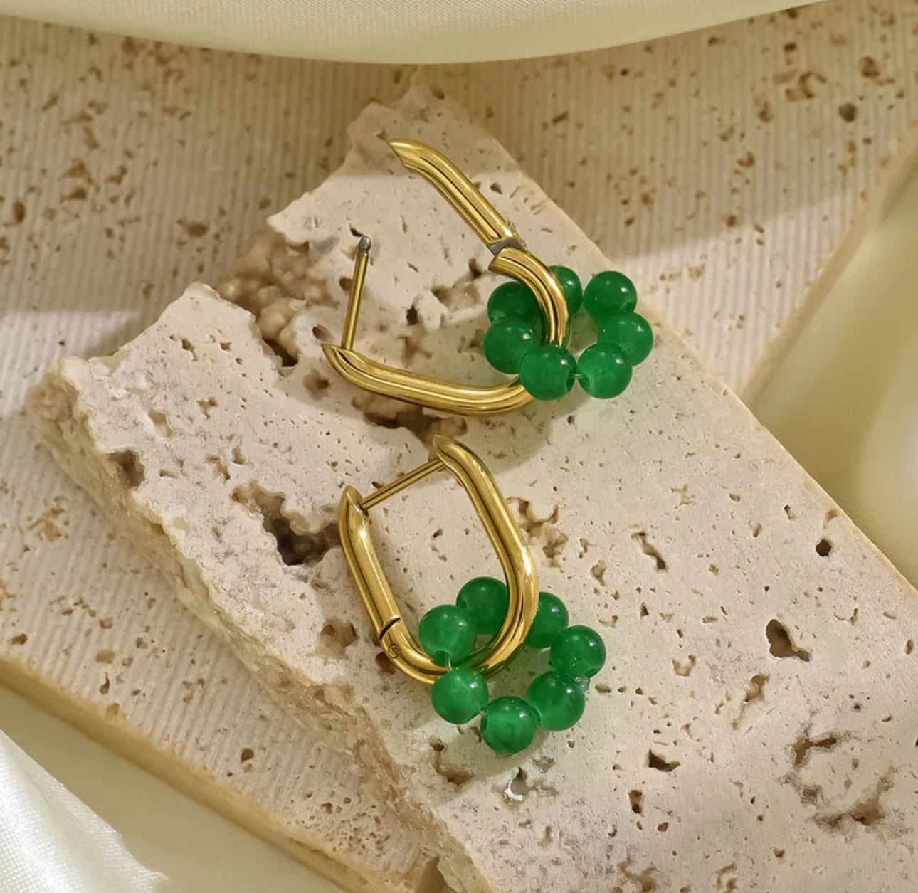 aretes de acero inoxidable con baño de oro de 14K