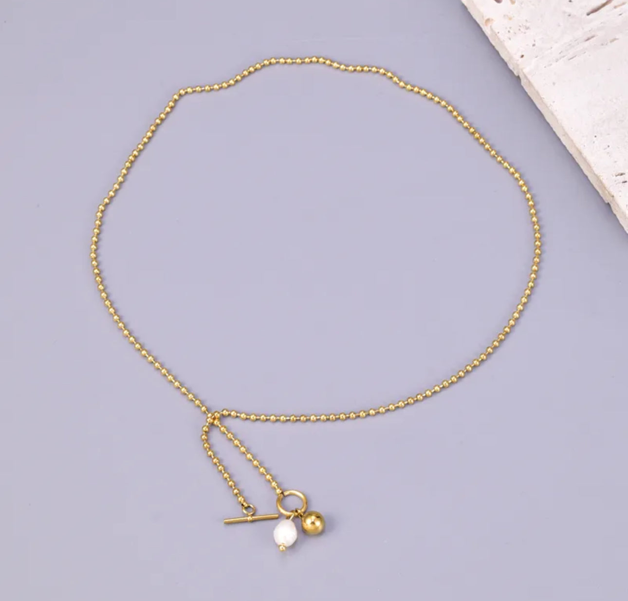 Collar de acero inoxidable con baño de oro