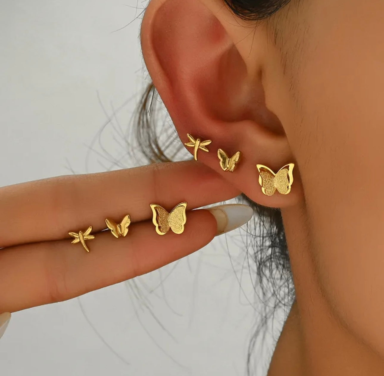 Juego de aretes con baño de oro